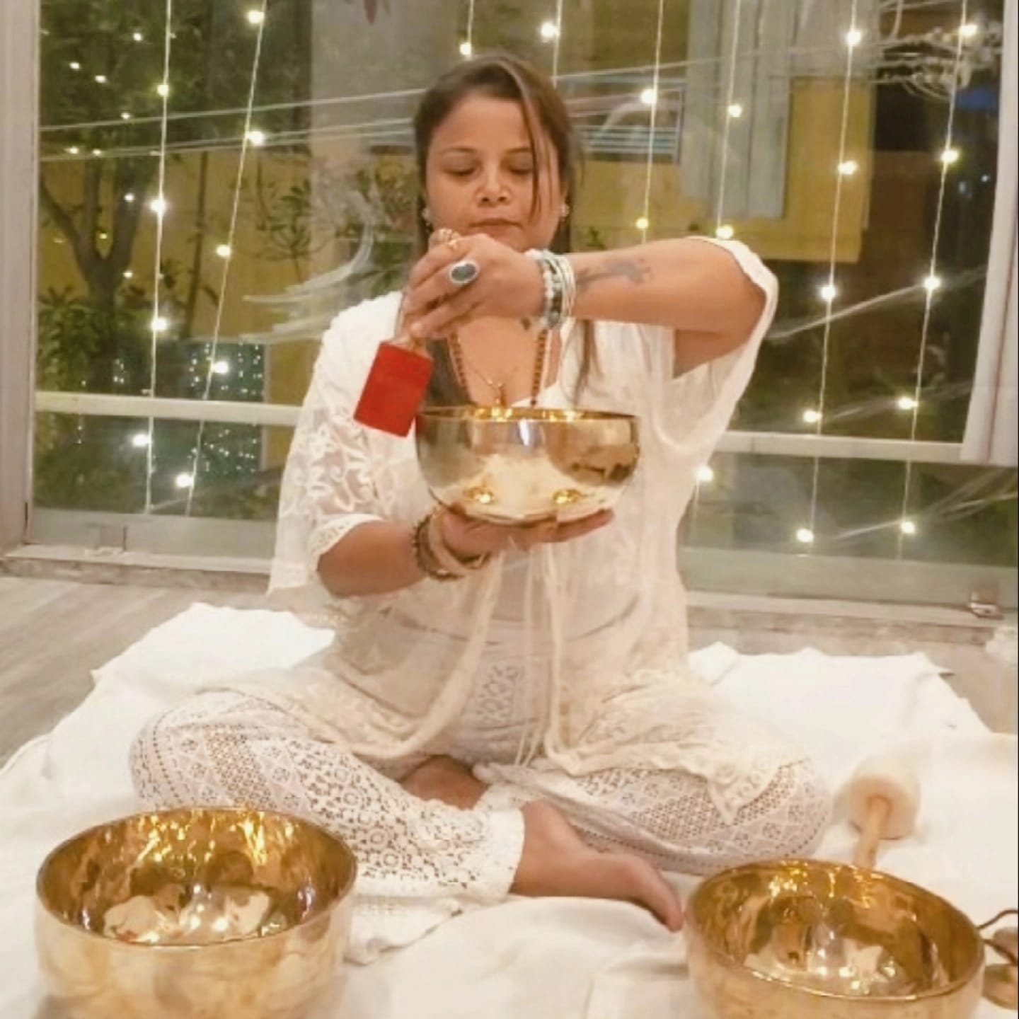 Holistic Healings sound healing practitioner with Tibetan singing bowls